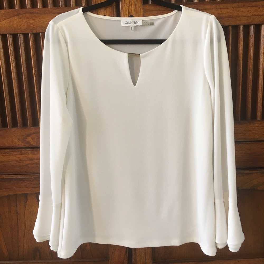 White Calvin Klein blouse with gold detail
